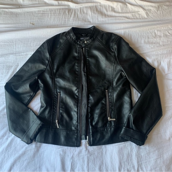 A black leather jacket made by Sardar London with zip front, vintage